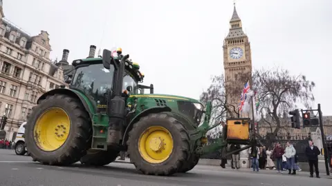PA Media A tractor near the near the Elizabeth Tower central London